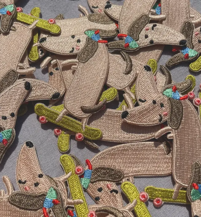 Iron-on skateboard dog patches