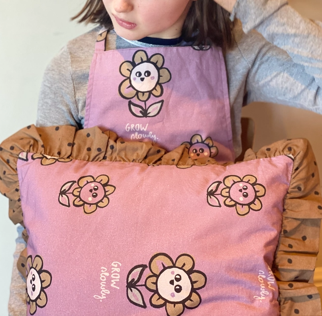 Floral and dotted print frilled cushion