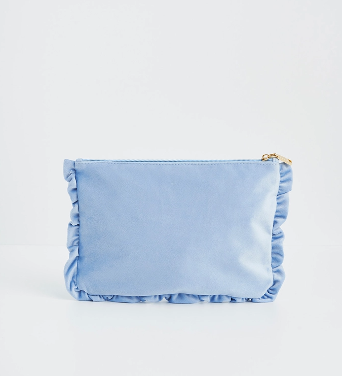 Lichtblauw fluwelen geborduurde pochette