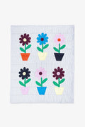 Geborduurd baby speelkleedje met bloemenmotief