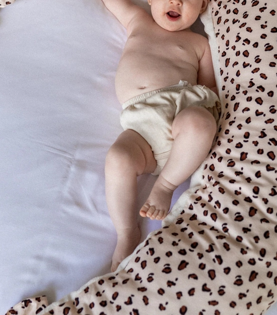 Leopard-print pregnancy and nursing pillow