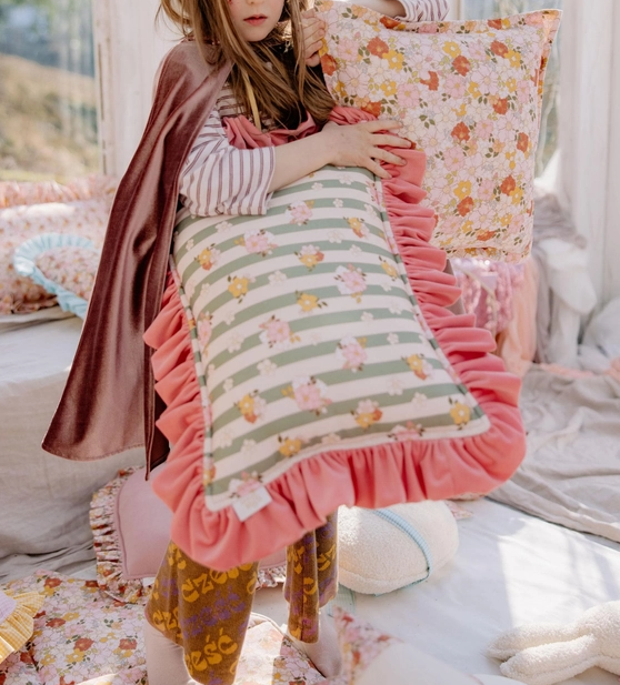 Striped and floral print ruffled pillow